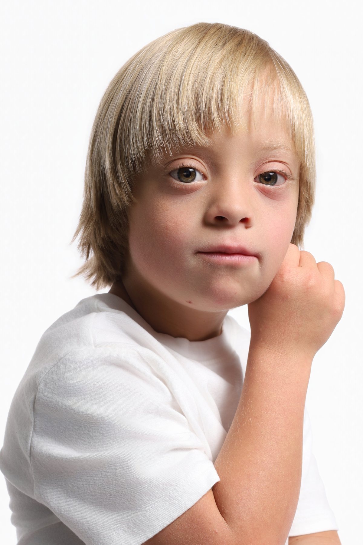 Wesley Wyatt close-up portrait, chin resting on his fist